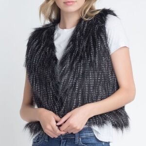 Dressy women’s vest (synthetic materials )
